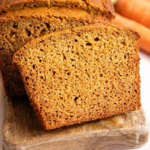 Slices of zucchini carrot bread on a cutting board.