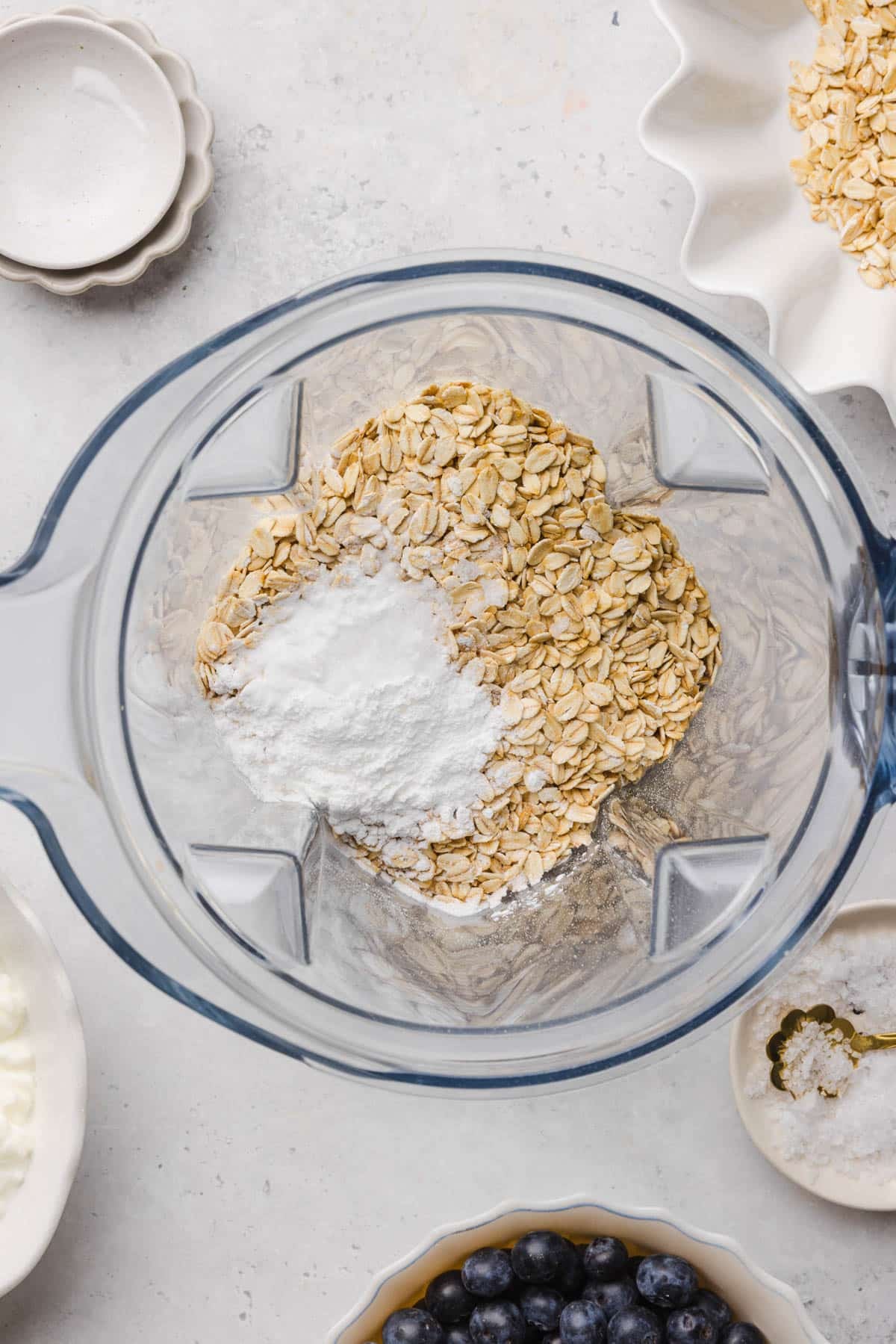 All of the dry ingredients in the blender bowl before blending.