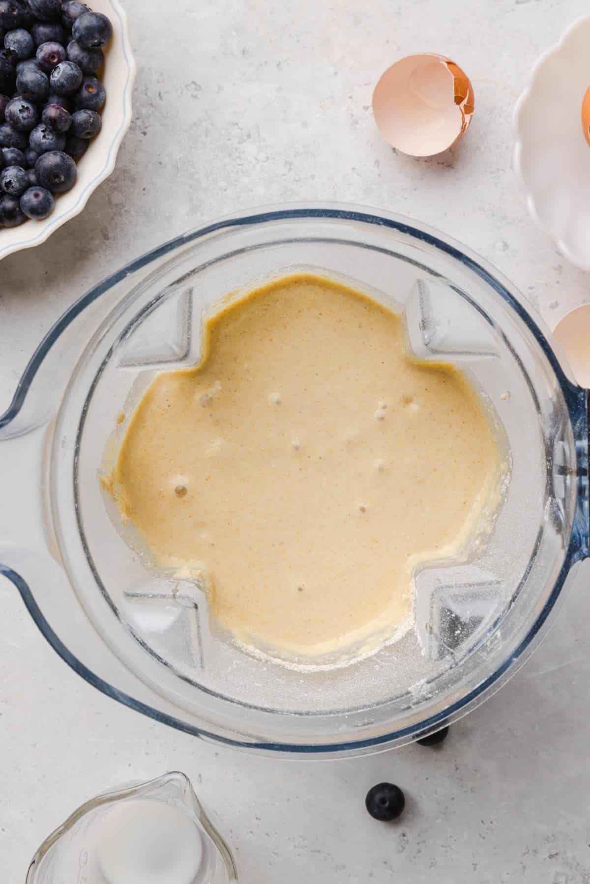 The pancake batter in the blender after blending the wet ingredients with the dry ingredients.