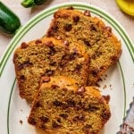 The sliced zucchini banana bread on a plate.