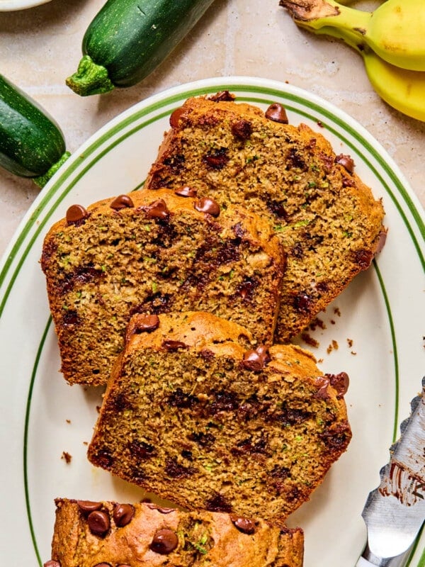 The sliced zucchini banana bread on a plate.