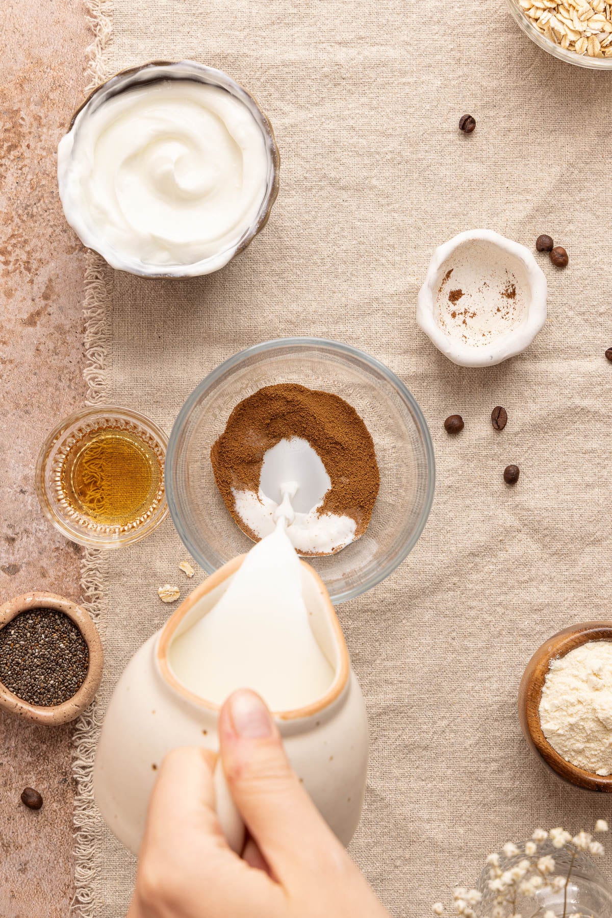 The mix and instant espresso powder in a jar before mixing.