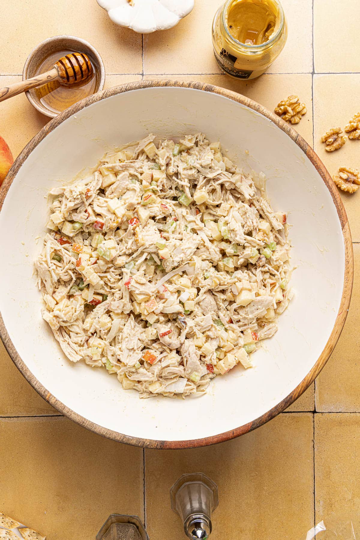 The honey mustard chicken salad in the large bowl after mixing everything together.