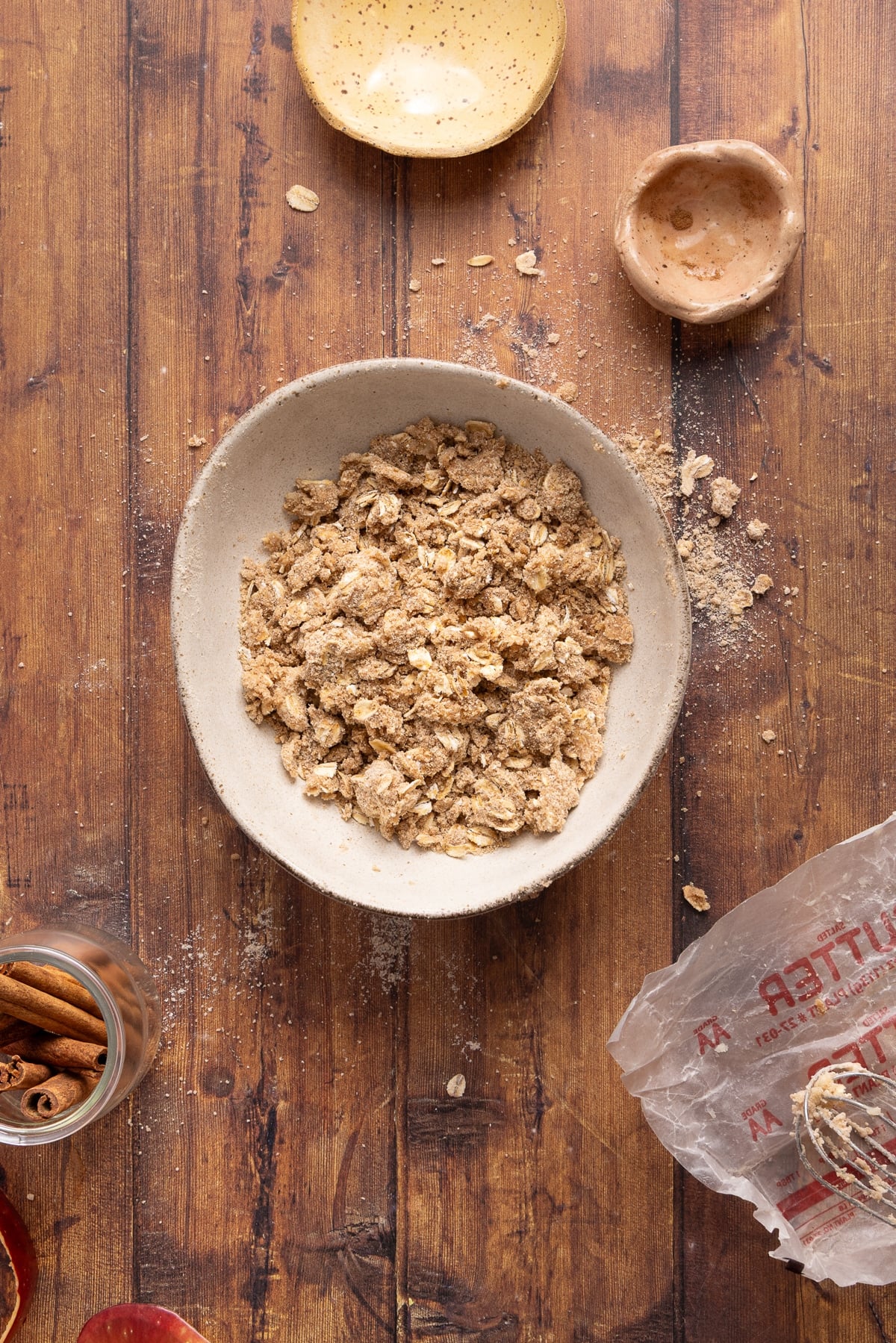 The cinnamon streusel topping ingredients in a white bowl after mixing.