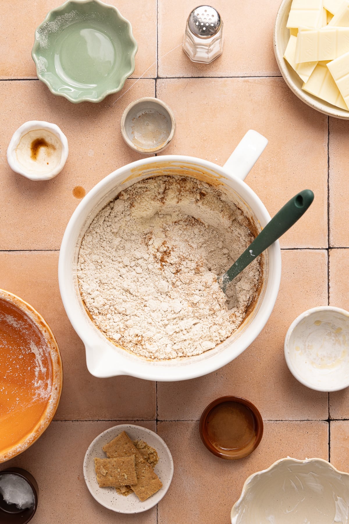 The mixed wet ingredients in the bowl with the flour, protein powder, spices, and salt before mixing everything together.