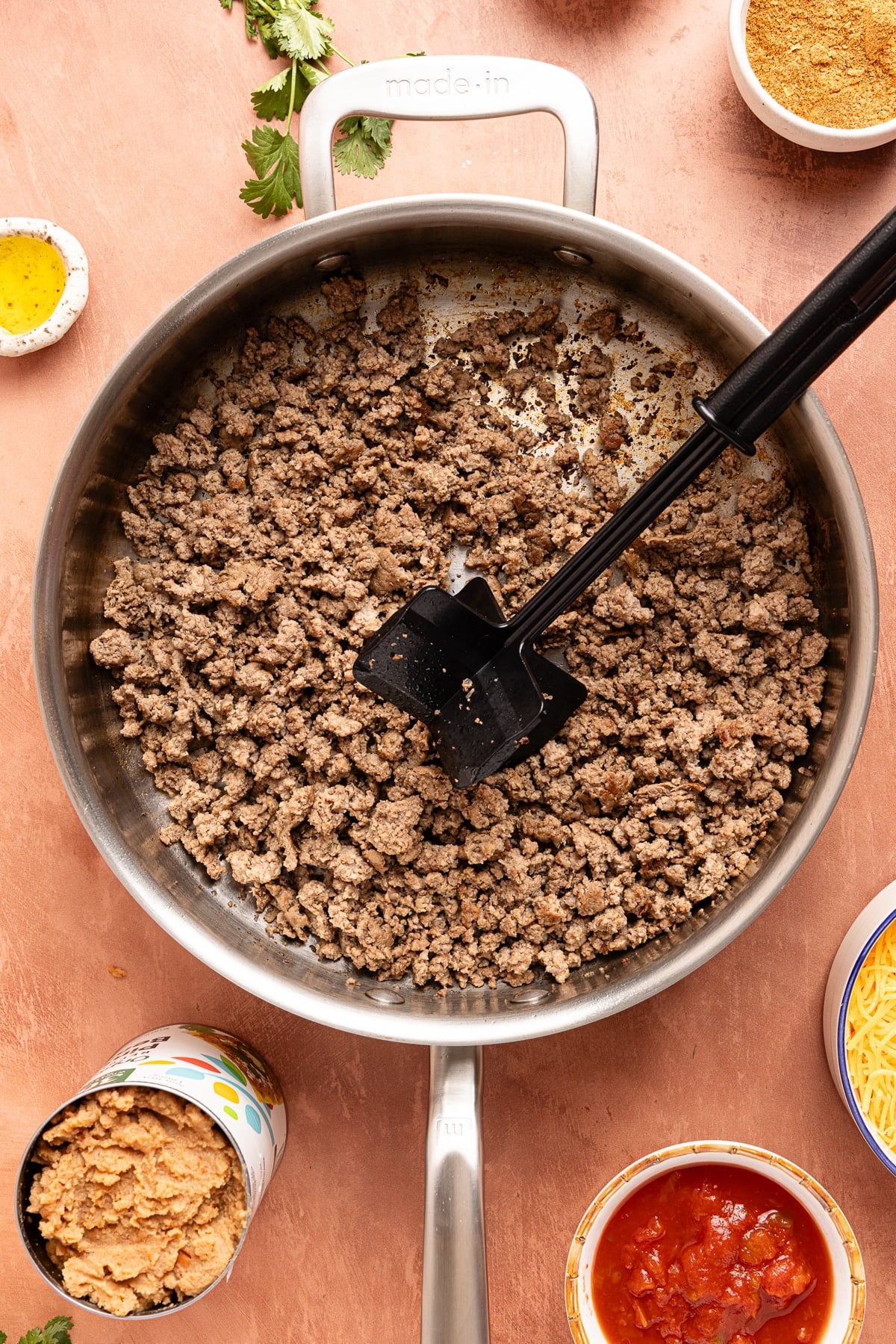Ground beef cooked in the skillet.