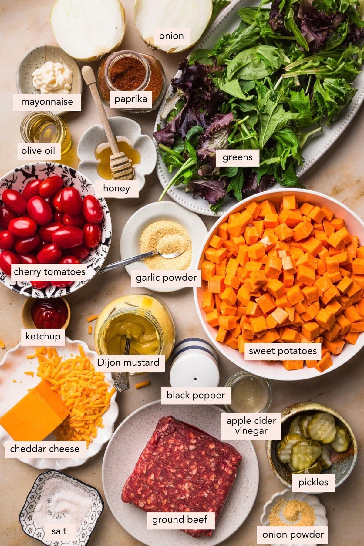 All of the ingredients Sweet Potato Burger bowls in bowls on a countertop.